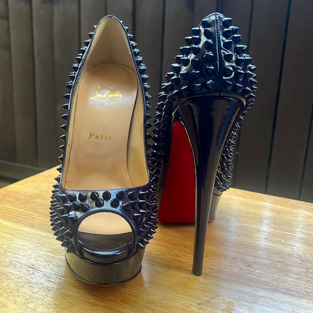 NEVER WORN. Brand new. Christian Louboutin heels.